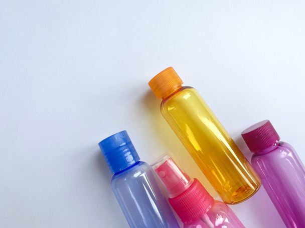 Colorful plastic travel bottles - Valokuva, kuva