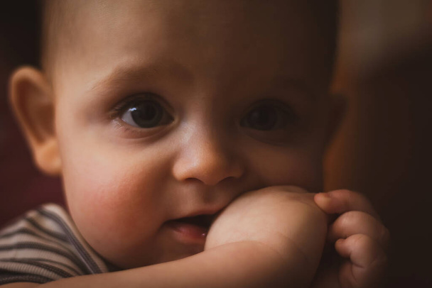 Teething in babies. Caucasian baby. Selective focus. - Photo, Image