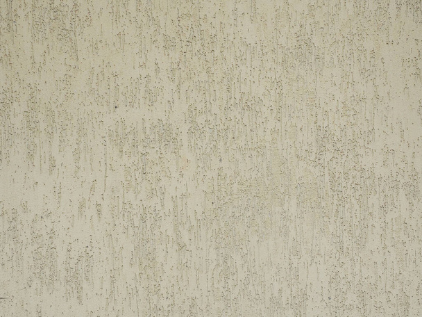 Wall with decorative textured beige cladding.Texture not seamless. Fullscreen photo - 写真・画像