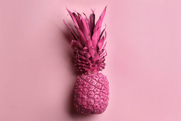 Painted pineapple on pink background, top view. Creative concept - Φωτογραφία, εικόνα