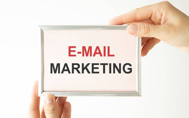E-mail marketing post it in business man hand - Foto, Imagen