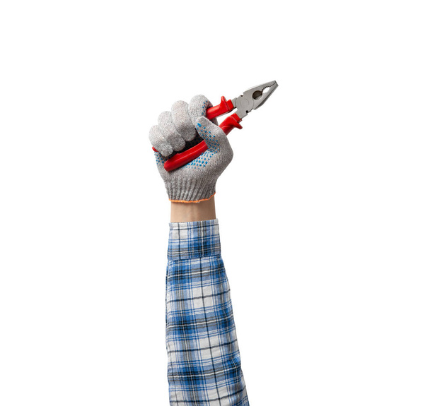 hand holds a construction tool pliers , on white background, isolated - Foto, immagini