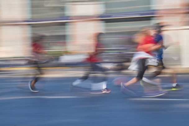 Runners at high speed on the streets - Valokuva, kuva
