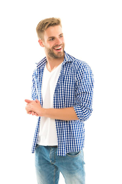 Young and carefree. unshaven guy has groomed hair isolated on white background. hairdresser service concept. skin and hair care. handsome young man wear checkered shirt. casual male fashion style - 写真・画像