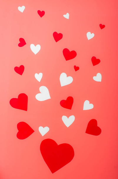 Hearts on a red background. Background for Valentine's Day, postcard. - Foto, afbeelding