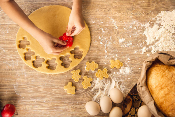Baking background. Child doing cookies. Closeup Top view - Foto, afbeelding