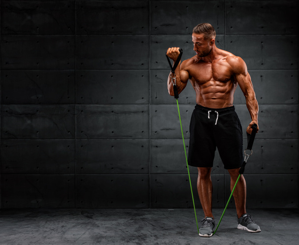 Muscular Men Training With Resistance Bands - Photo, Image