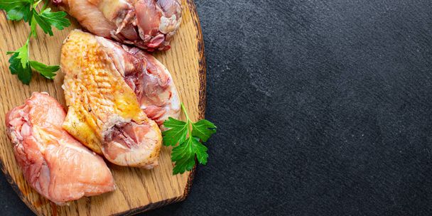 chicken pieces raw rooster or goose fresh farm meat duck on the table for healthy meal snack outdoor top view copy space for text food background image rustic keto or paleo diet - Photo, image