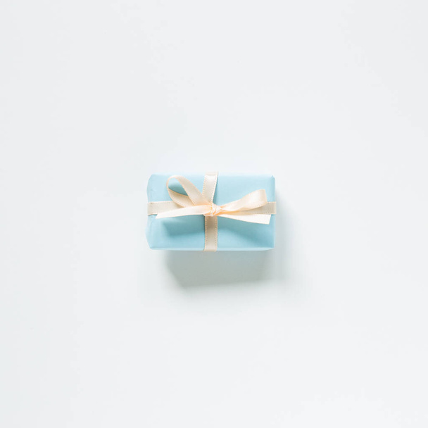 Sky blue gift box isolated on white background. top view, copy space - Zdjęcie, obraz