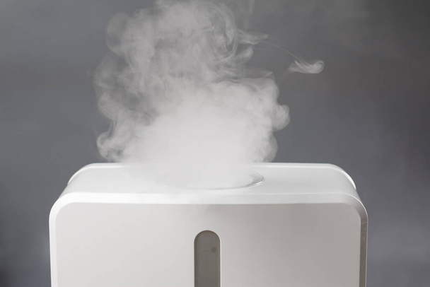 White air humidifier during work clean air and vaporizes steam up. Improving comfort of people. - Photo, Image