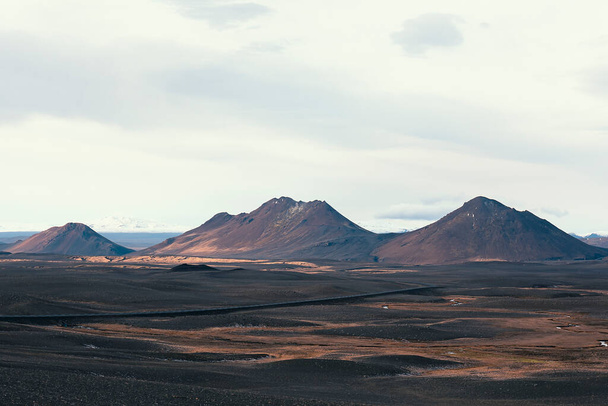 Volcanic desert in the middle of Iceland. Beautiful landscape of volcanoes in a desert landscape. - Фото, изображение