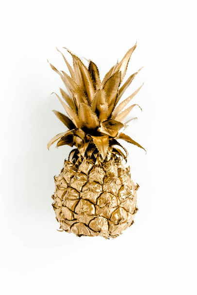 Top view golden pineapple isolated on white background. Food concept. Template blog social media. Minimal style. flat lay - Fotografie, Obrázek