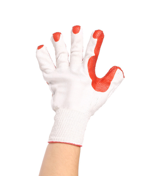 Hand in gloves shows five - 写真・画像