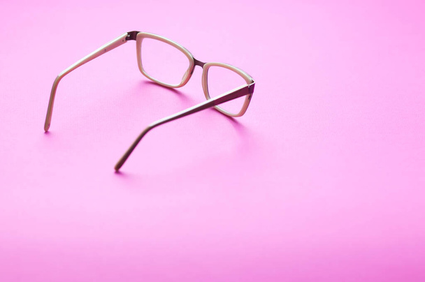 eyeglasses on color background - Photo, Image