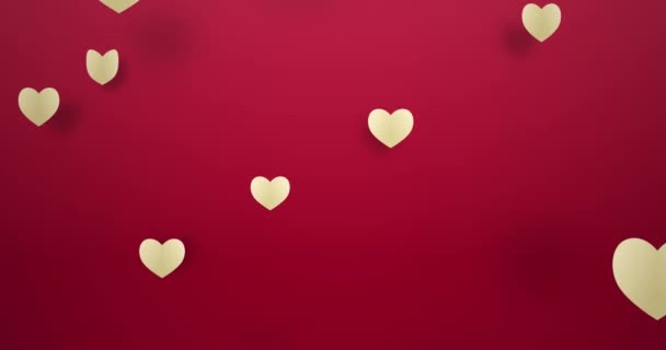 Forme de coeur volant sur fond de vacances rose. Symboles d'amour pour les femmes heureuses, les mères, la Saint-Valentin, conception de carte de vœux d'anniversaire - Séquence, vidéo