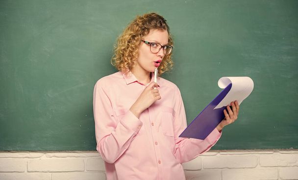 girl teacher at private lesson. essay writing. teacher with document folder. report project. back to school. thinking student in glasses at blackboard. next school year. Girl prepare for exams - Foto, immagini