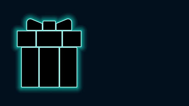 Parlayan neon hattı hediye kutusu simgesi siyah arkaplanda izole edildi. Sevgililer Günü. 4K Video hareketli grafik canlandırması - Video, Çekim