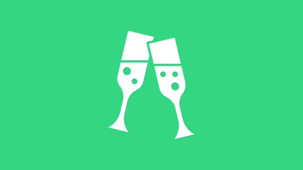 Bílé sklo ikony šampaňského izolované na zeleném pozadí. Grafická animace pohybu videa 4K - Záběry, video
