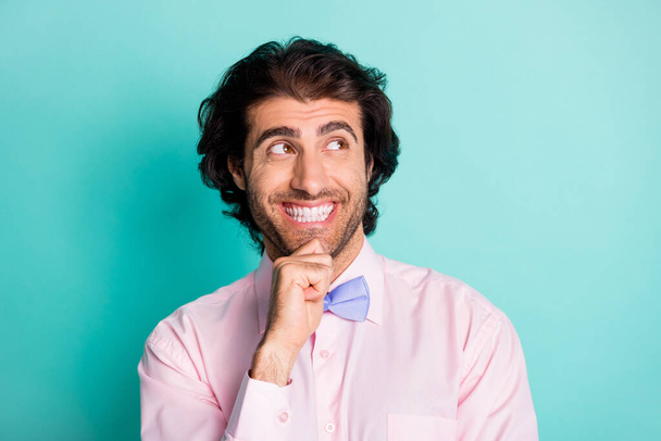 Portrait of positive smiling brunet guy wear tie looking empty space isolated on torques background - Fotografie, Obrázek