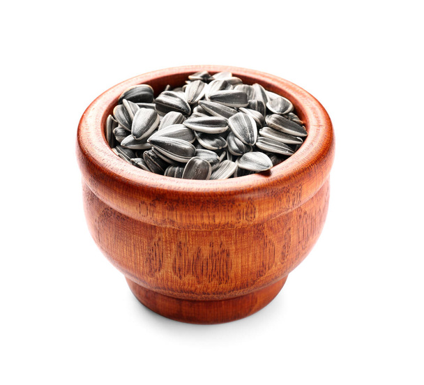 Bowl with sunflower seeds on white background - Photo, Image