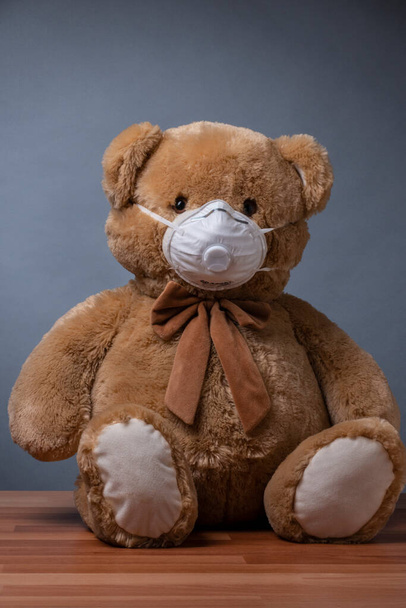 Teddy bear with protective mouth mask - Photo, Image