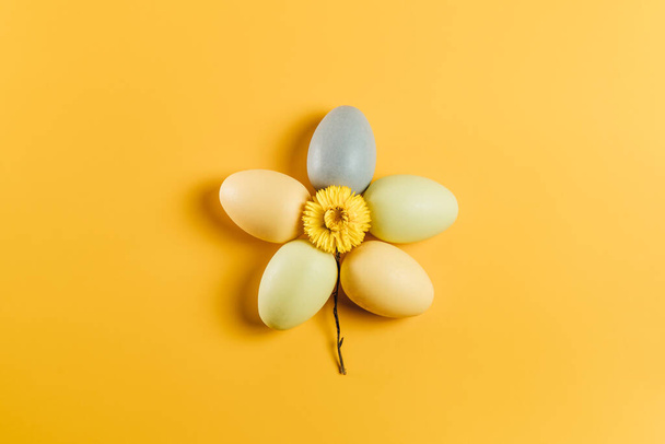 Creative flat lay photo of easter eggs on colorful background - Foto, Imagen