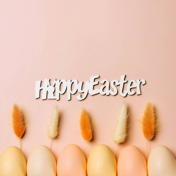Creative flat lay photo of easter eggs on colorful background - Фото, зображення