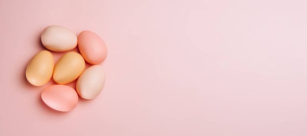 Creative flat lay photo of easter eggs on colorful background - Valokuva, kuva