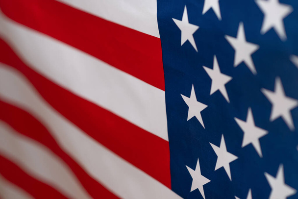 American flag as a background. Blurred background.  - Φωτογραφία, εικόνα