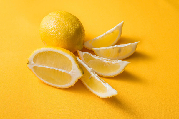 Lemon slices on a jellied background top view - Photo, Image