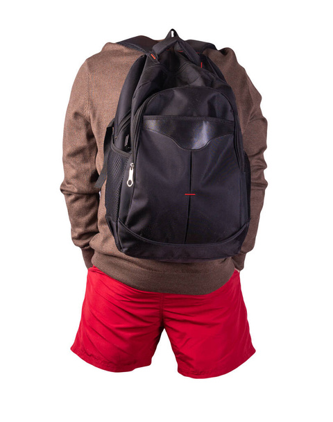 black backpack,red shorts,brown sweater isolated on white background. casual wear - Фото, зображення