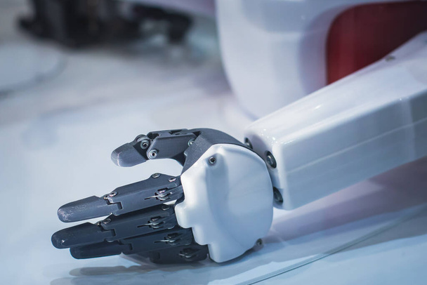 Hydraulic mechanical cyborg robot arm in hand shake gesture, robotized manipulator on  manufacture line - Foto, imagen