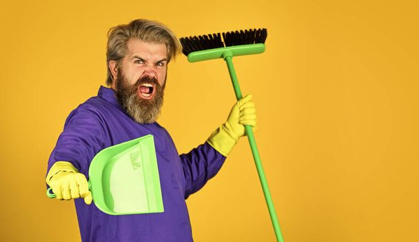 Tired housekeeper. cleaning service people. mature male worker with broom cleaning. Male Janitor Cleaning With Broom. Man cleaning home with broom. Janitor man sweeping. spring clean - Photo, Image