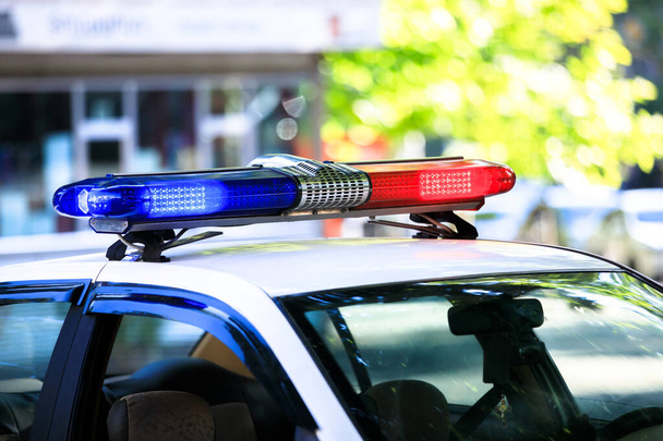 Police cars with red and blue color siren - 写真・画像