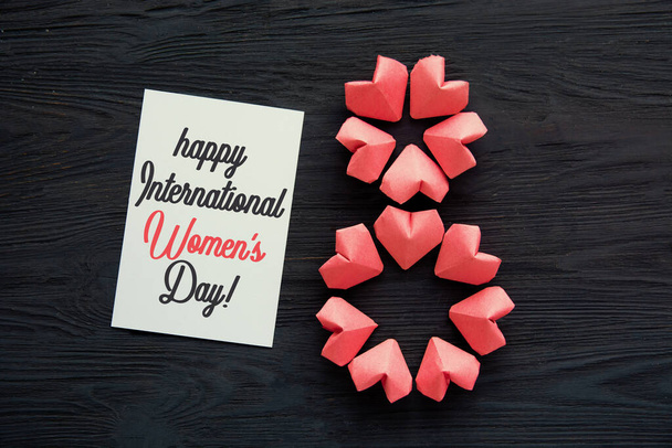 rose-color paper hearts shape figure eight 8, International Women's Day, March 8, Happy Women's Day greeting - Fotó, kép