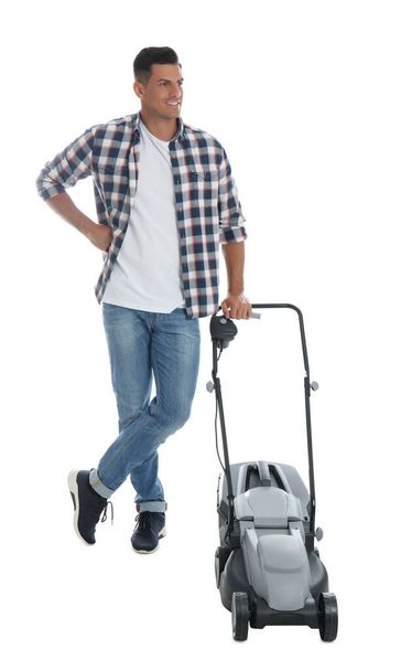 Man with modern lawn mower on white background - Photo, image