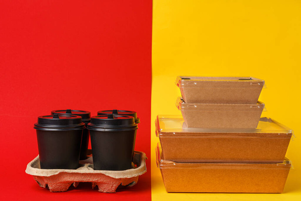 Coffee cups and takeaway food package. Takeout meal - Zdjęcie, obraz