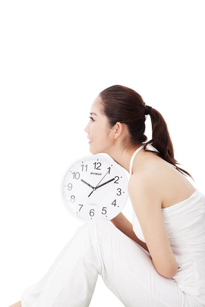 Young fashion woman holding clocks - Фото, зображення