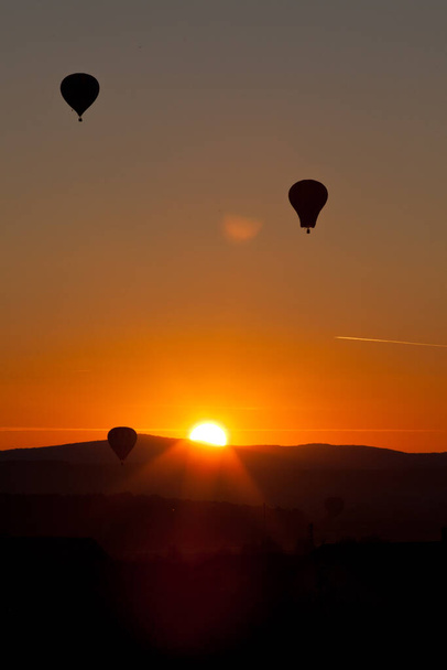 hot air balloons at sunset - freedom and adventure concept - Zdjęcie, obraz