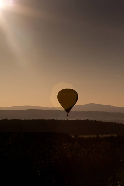 hot air balloons at sunset - freedom and adventure concept - Fotó, kép