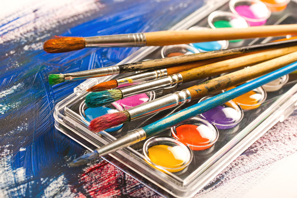 Paints and brushes - Фото, изображение