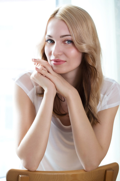Portrait of a beautiful female model on white background  - Photo, Image