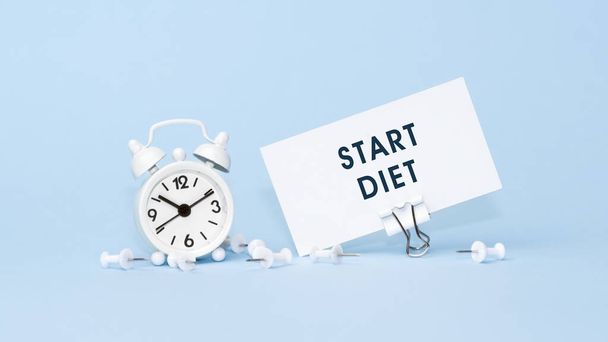 Start Dieet - concept van tekst op visitekaartje. Sluiten van een persoonlijke agenda - Foto, afbeelding