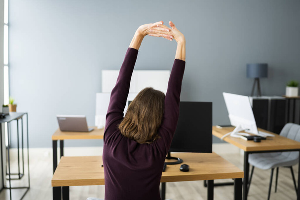 Stretching Exercise At Office Desk. Woman At Work - Foto, Imagem