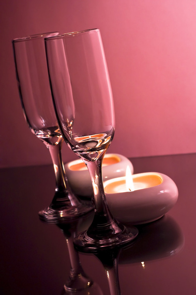 Champagne glasses and candle. - Photo, image
