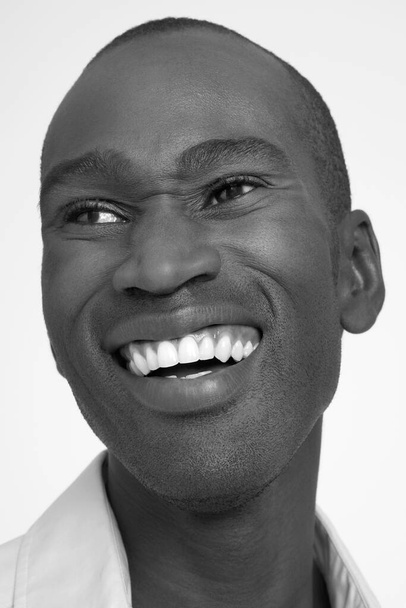 Black and white photo of african man smiling - Fotó, kép