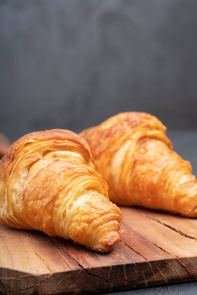 Delicious snack croissant on wood - Photo, Image