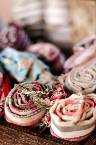 mixed traditional krama cotton scarf souvenirs detail on display at shop in angkor wat in cambodia - Photo, Image
