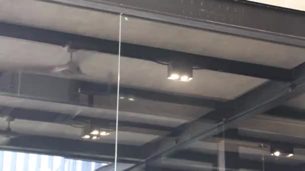 Black ceiling electric fan interior for summer climate, stock footage - Felvétel, videó