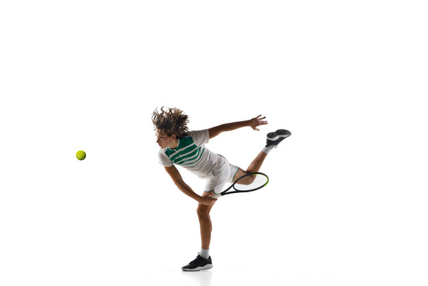 Young caucasian professional sportsman playing tennis isolated on white background - Valokuva, kuva